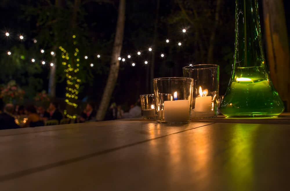 Dining with candles- Big easy landscaping